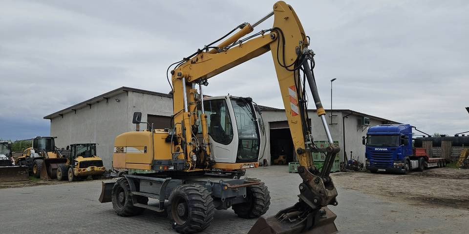 Koparka kołowa Liebherr A314 Litronic 9350 h 4 łyżki kołówka - حفارة على عجلات: صور 4 Koparka kołowa Liebherr A314 Litronic 9350 h 4 łyżki kołówka - حفارة على عجلات: صور 4