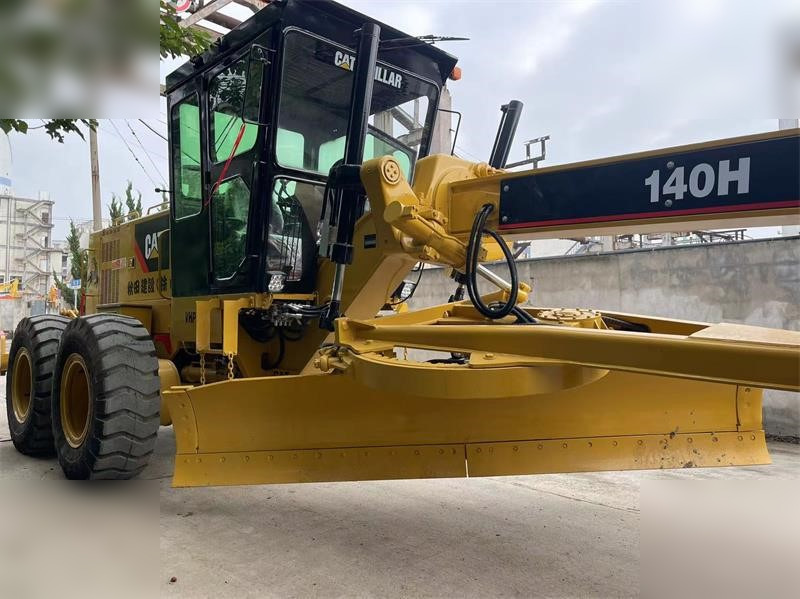 آلة تسوية الأرض CATERPILLAR 140H: صور 11
