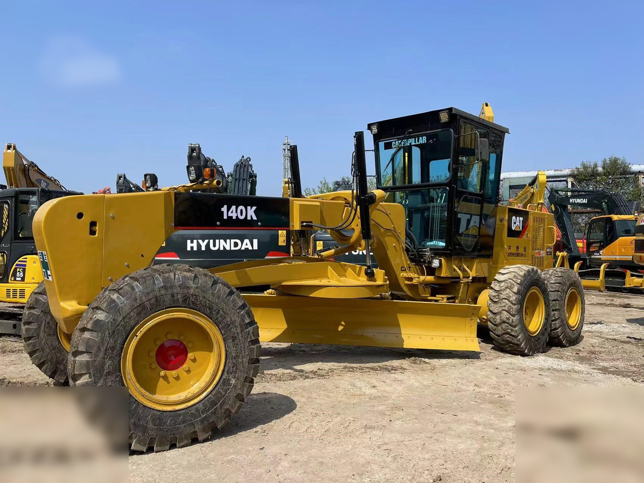 CATERPILLAR 140K - آلة تسوية الأرض: صور 1 CATERPILLAR 140K - آلة تسوية الأرض: صور 1