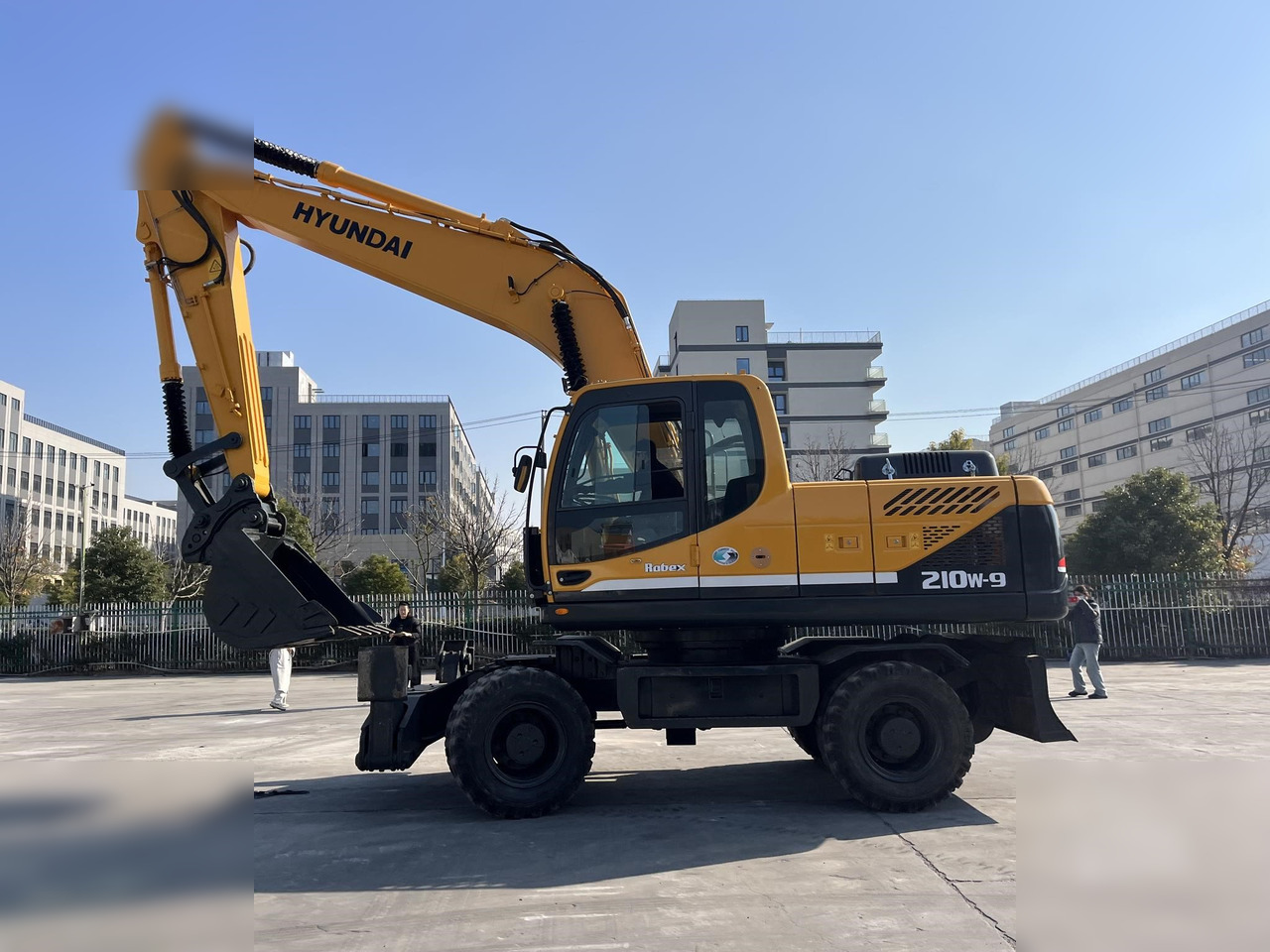 HYUNDAI ROBEX 210W-9 - حفارة على عجلات: صور 1 HYUNDAI ROBEX 210W-9 - حفارة على عجلات: صور 1