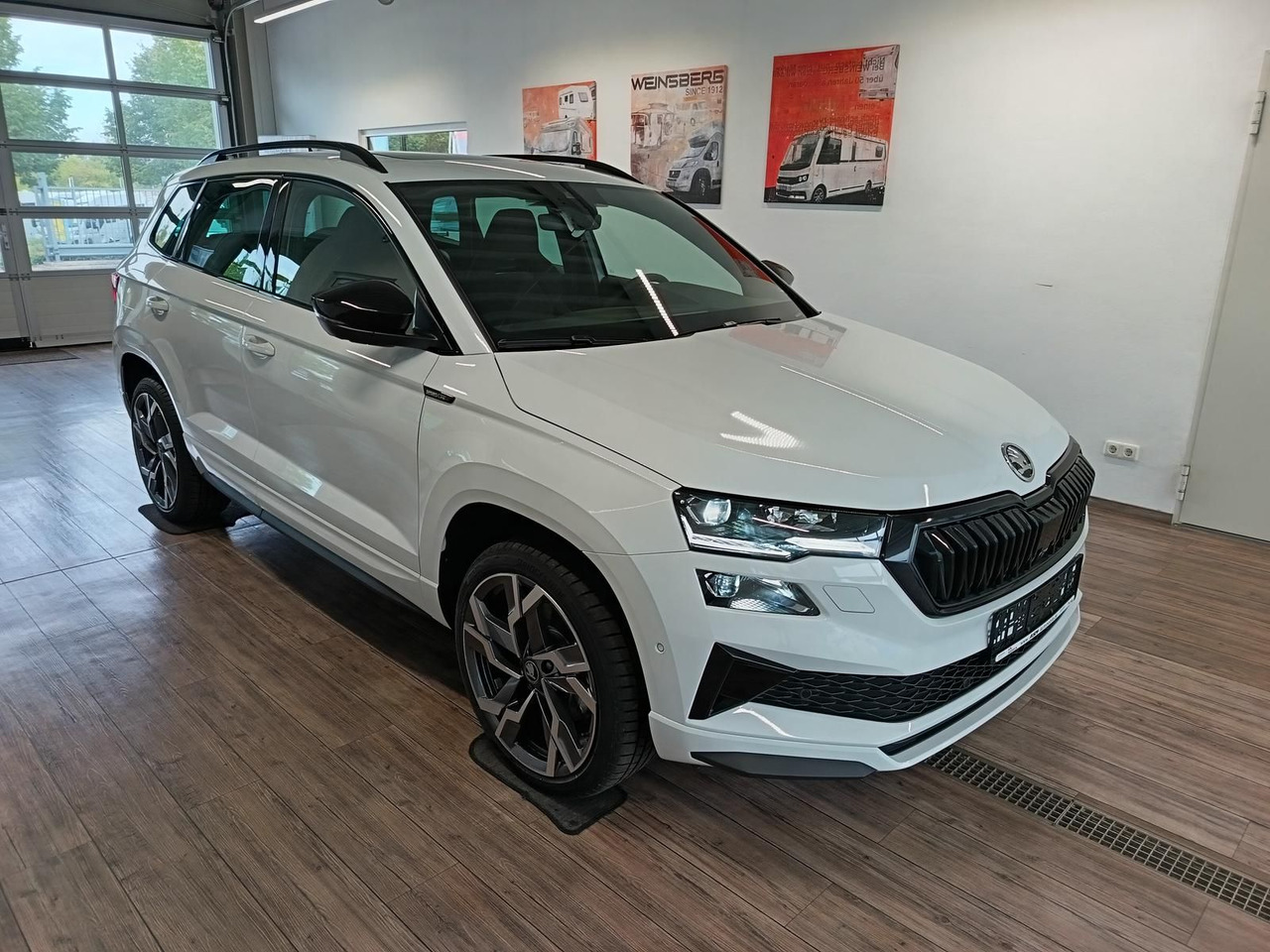 Skoda Karoq Sportline 1,5 TSI DSG*AHK*PSD*STD.HZG*NAVI - سيارة دفع رباعي: صور 3 Skoda Karoq Sportline 1,5 TSI DSG*AHK*PSD*STD.HZG*NAVI - سيارة دفع رباعي: صور 3