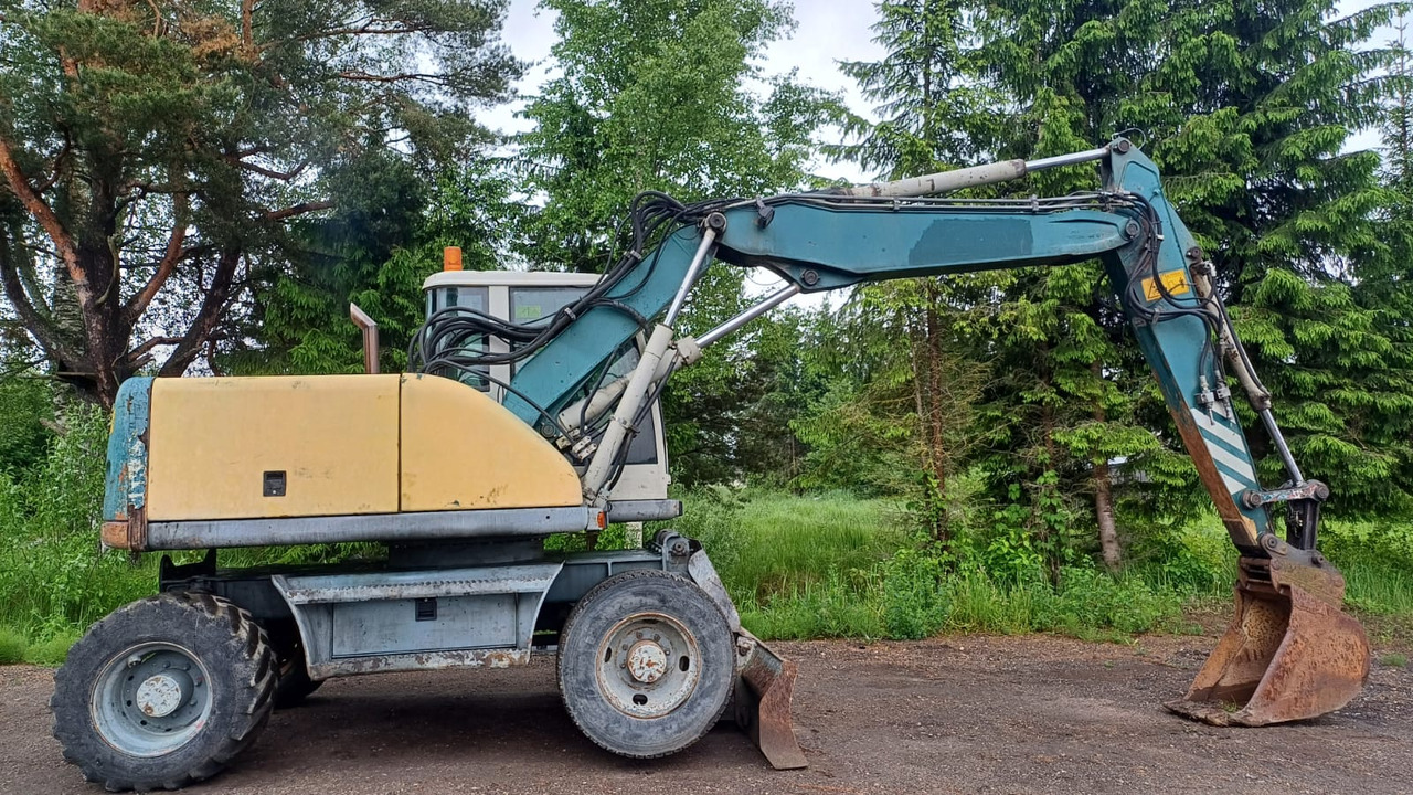 Volvo EW140 - حفارة على عجلات: صور 5 Volvo EW140 - حفارة على عجلات: صور 5