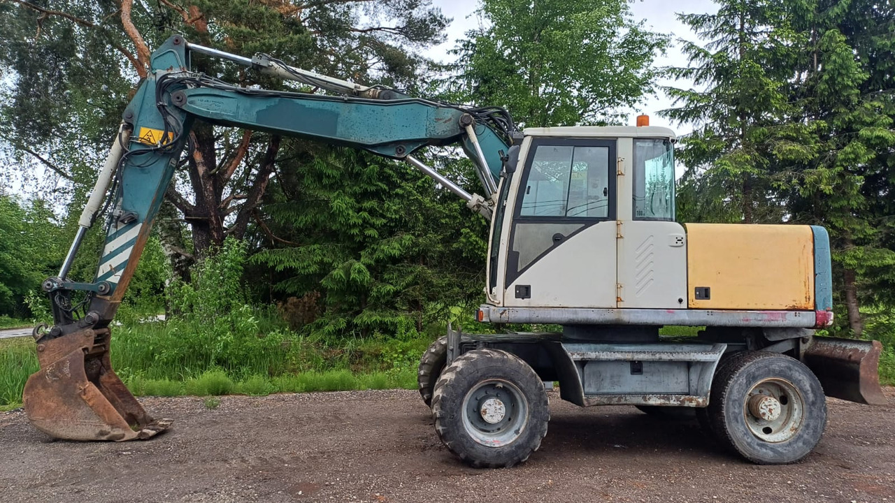Volvo EW140 - حفارة على عجلات: صور 2 Volvo EW140 - حفارة على عجلات: صور 2