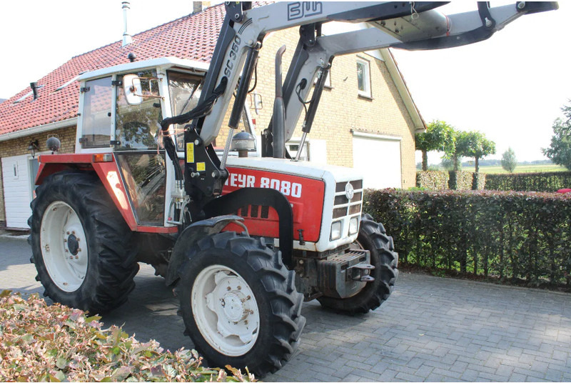 Steyr 8080 met voorlader 40 kmh - جرار: صور 1 Steyr 8080 met voorlader 40 kmh - جرار: صور 1