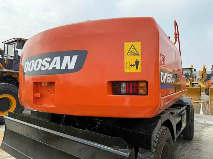 90% Brand New Doosan Brand Dh150w-7 Wheel Excavator in Stock Used Korea Brand Doosan Dh55 Dh60 Dh150 Dh210 Excavator for Sale - حفارة على عجلات: صور 3 90% Brand New Doosan Brand Dh150w-7 Wheel Excavator in Stock Used Korea Brand Doosan Dh55 Dh60 Dh150 Dh210 Excavator for Sale - حفارة على عجلات: صور 3