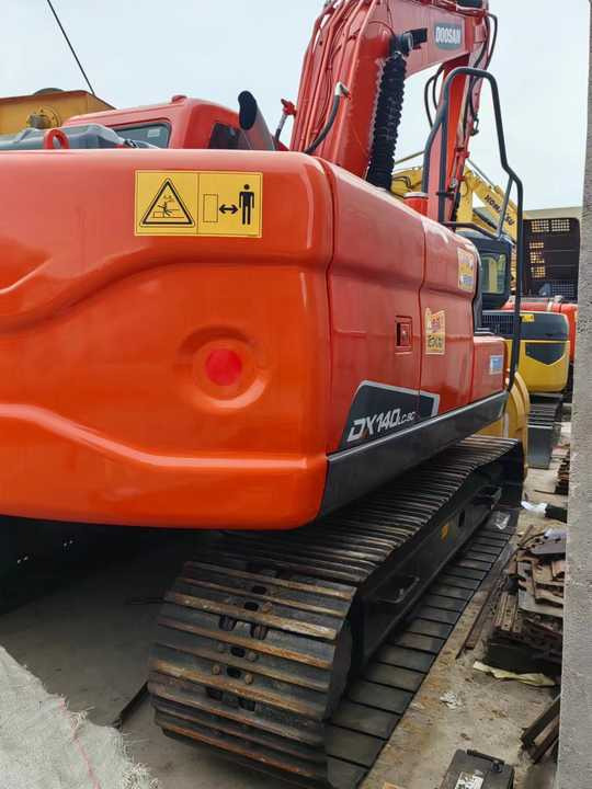 Used Digger DOOSAN DX140 Construction Machinery Construction Digger Used DOOSAN DX140 Cheap Excavator - حفارات زحافة: صور 3 Used Digger DOOSAN DX140 Construction Machinery Construction Digger Used DOOSAN DX140 Cheap Excavator - حفارات زحافة: صور 3