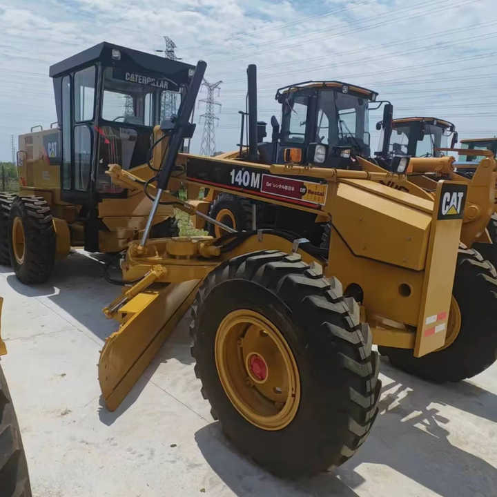 Used Japan Imported Caterpillar 140M Cat 140m Motor Grader with Good Quality and Low Price for Sale - حفارة: صور 1 Used Japan Imported Caterpillar 140M Cat 140m Motor Grader with Good Quality and Low Price for Sale - حفارة: صور 1