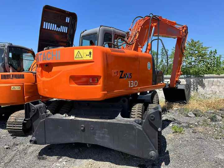 Used Wheel Excavator Hitachi ZX 130W Made in Japan 13ton Hitachi Zx130w Wheel Excavator Price Used Hitachi Zx130 Excavator SALE - حفارة: صور 2 Used Wheel Excavator Hitachi ZX 130W Made in Japan 13ton Hitachi Zx130w Wheel Excavator Price Used Hitachi Zx130 Excavator SALE - حفارة: صور 2