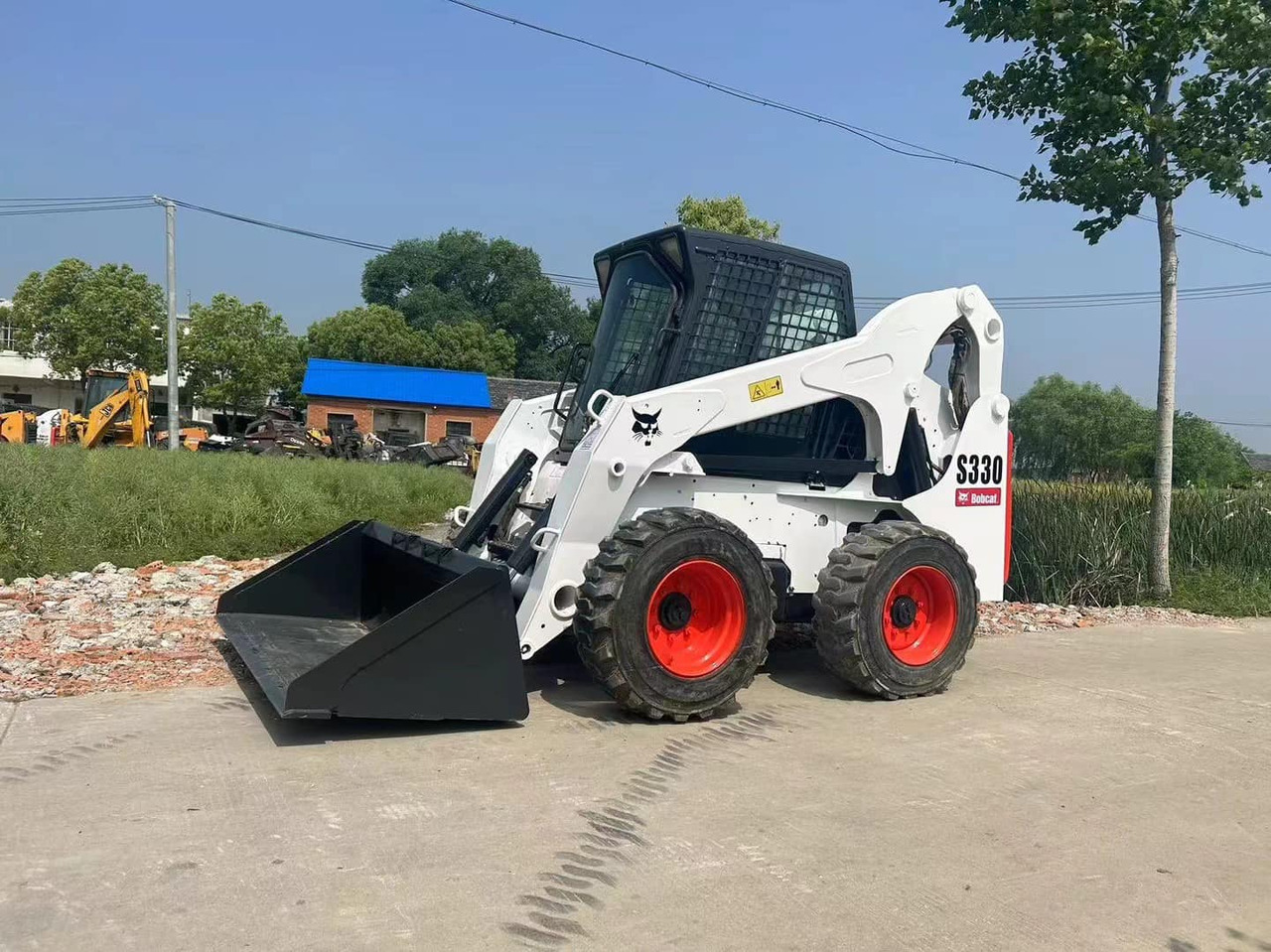 BOBCAT S330 - شيول صغير: صور 3 BOBCAT S330 - شيول صغير: صور 3