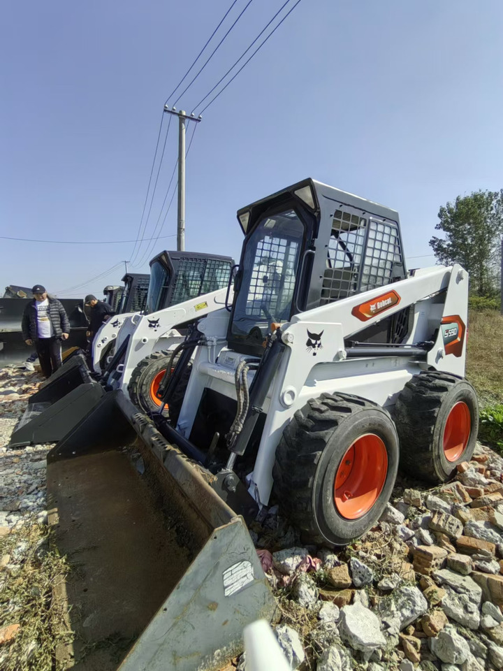 BOBCAT S590 - شيول صغير: صور 1 BOBCAT S590 - شيول صغير: صور 1