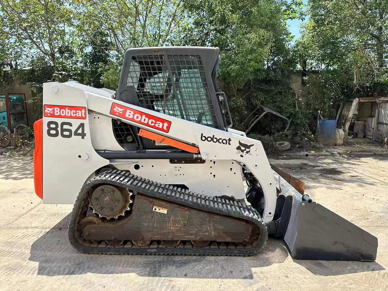 BOBCAT T864 - شيول صغير: صور 1 BOBCAT T864 - شيول صغير: صور 1