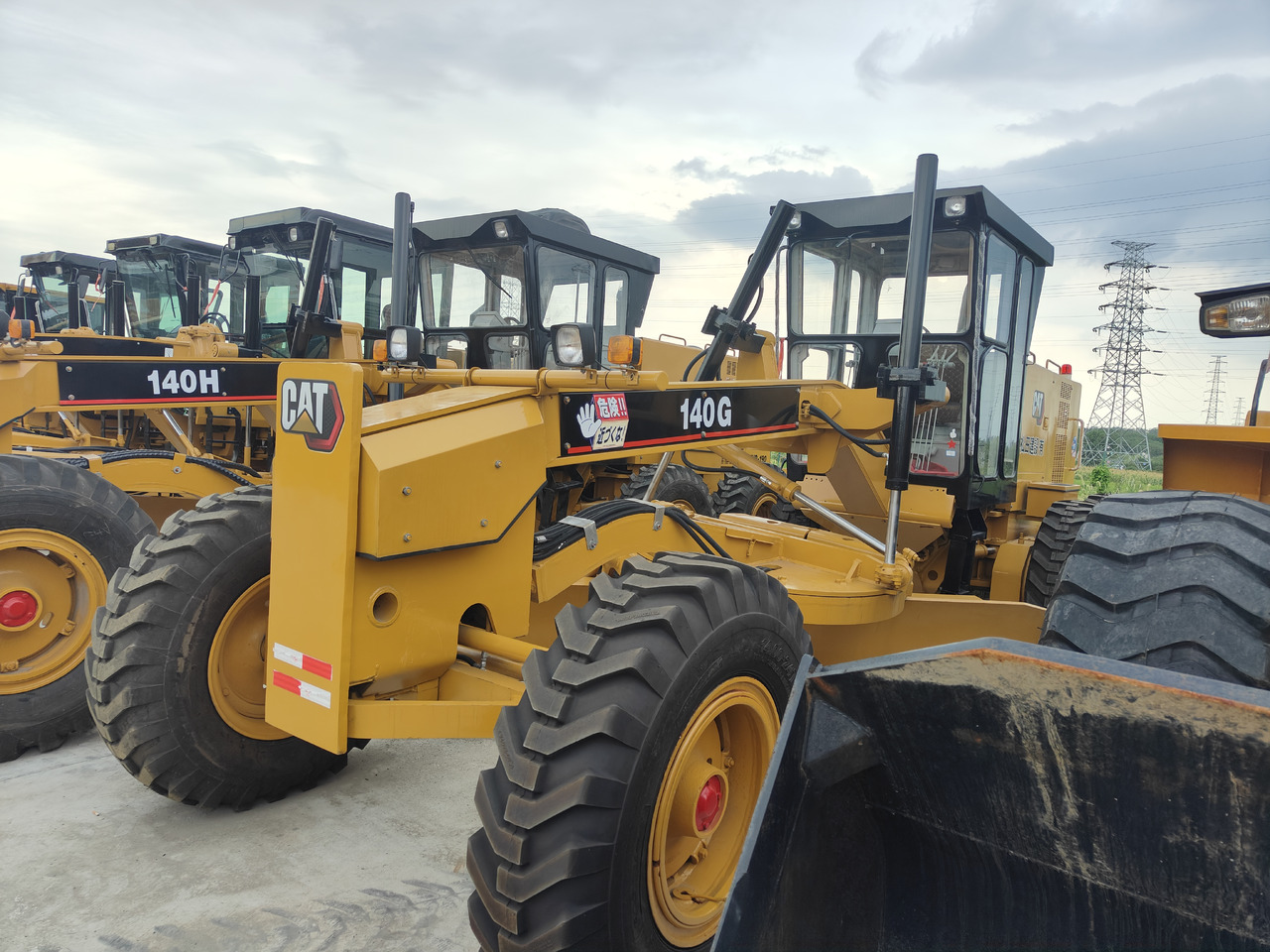 CATERPILLAR 140G - آلة تسوية الأرض: صور 1 CATERPILLAR 140G - آلة تسوية الأرض: صور 1