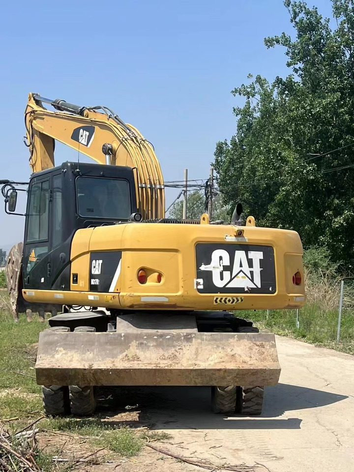 CATERPILLAR M317 - حفارة على عجلات: صور 4 CATERPILLAR M317 - حفارة على عجلات: صور 4