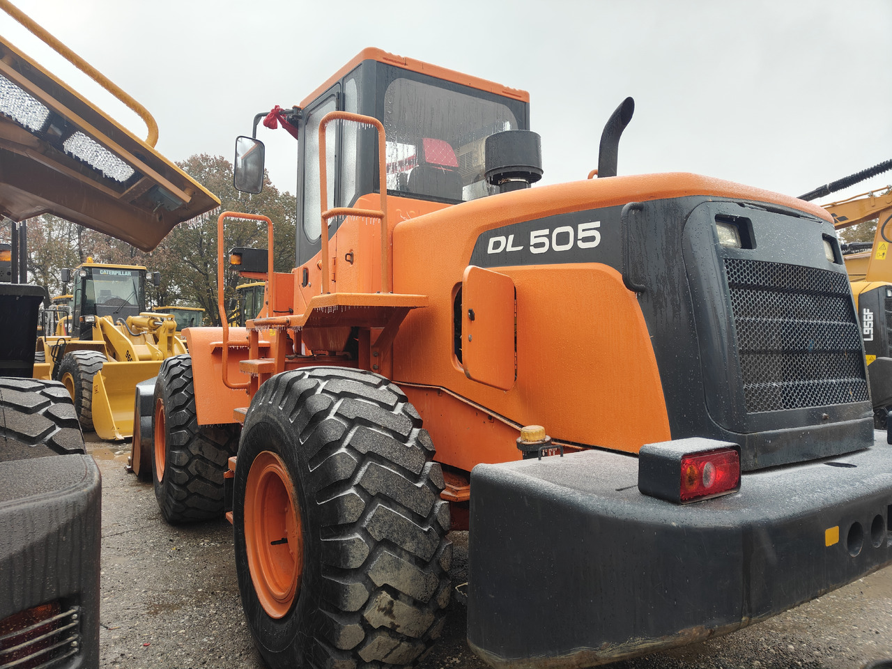 DOOSAN DL505 - اللودر بعجل: صور 1 DOOSAN DL505 - اللودر بعجل: صور 1