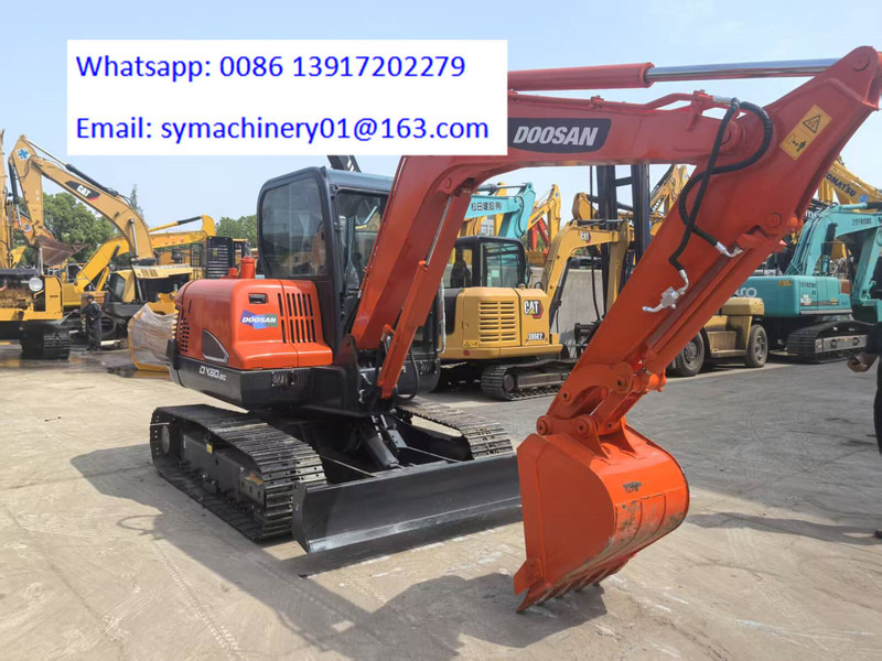 Doosan DX60 - حفارة مصغرة: صور 1 Doosan DX60 - حفارة مصغرة: صور 1