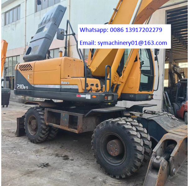 Hyundai R210W - حفارة على عجلات: صور 4 Hyundai R210W - حفارة على عجلات: صور 4