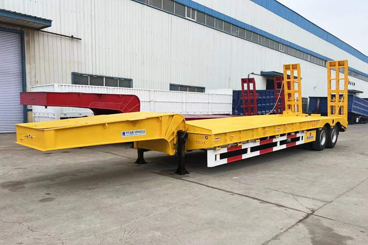 TITAN 2 Axle Low Bed Trailer for Sale in Guyana - عربة مسطحة منخفضة نصف مقطورة: صور 1 TITAN 2 Axle Low Bed Trailer for Sale in Guyana - عربة مسطحة منخفضة نصف مقطورة: صور 1