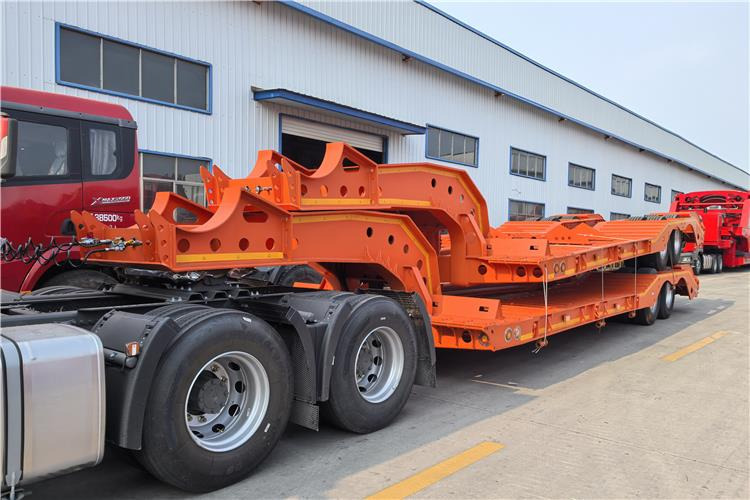 TITAN 2 Axle Low Low Bed Trailer for Sale In Angola - عربة مسطحة منخفضة نصف مقطورة: صور 1 TITAN 2 Axle Low Low Bed Trailer for Sale In Angola - عربة مسطحة منخفضة نصف مقطورة: صور 1