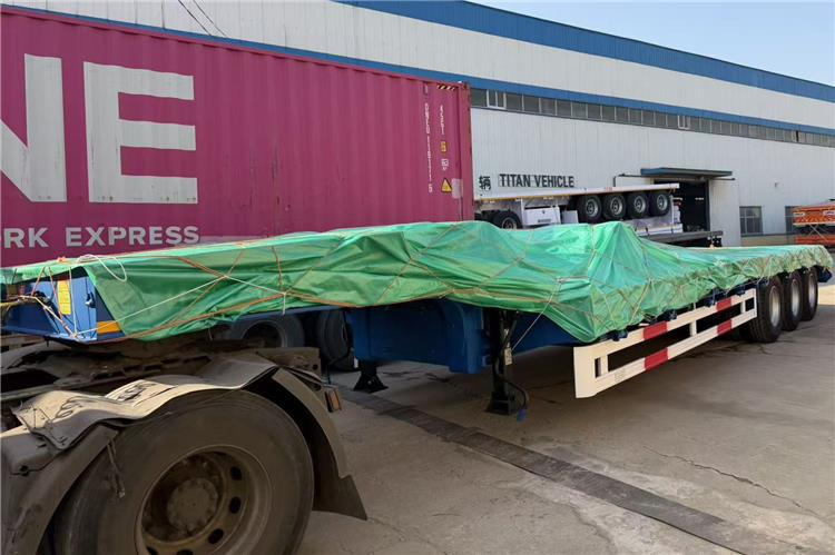 TITAN 3 Axle 80 Ton Low Bed Trailer Price for Sale In Nigeria - عربة مسطحة منخفضة نصف مقطورة: صور 4 TITAN 3 Axle 80 Ton Low Bed Trailer Price for Sale In Nigeria - عربة مسطحة منخفضة نصف مقطورة: صور 4
