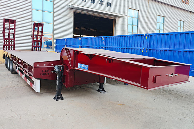 TITAN 3 Axle Low Bed Trailer for Sale in Saudi Arabia - عربة مسطحة منخفضة نصف مقطورة: صور 1 TITAN 3 Axle Low Bed Trailer for Sale in Saudi Arabia - عربة مسطحة منخفضة نصف مقطورة: صور 1