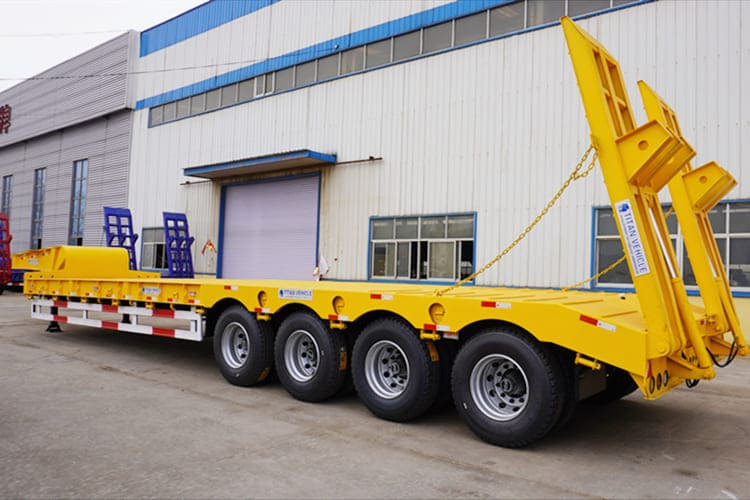 TITAN 4 Axle Lowbed Trailer Truck for Sale in Zambia - عربة مسطحة منخفضة نصف مقطورة: صور 3 TITAN 4 Axle Lowbed Trailer Truck for Sale in Zambia - عربة مسطحة منخفضة نصف مقطورة: صور 3