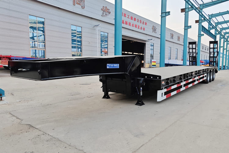 TITAN Low Bed Semi Trailer for Sale in Zambia - عربة مسطحة منخفضة نصف مقطورة: صور 1 TITAN Low Bed Semi Trailer for Sale in Zambia - عربة مسطحة منخفضة نصف مقطورة: صور 1