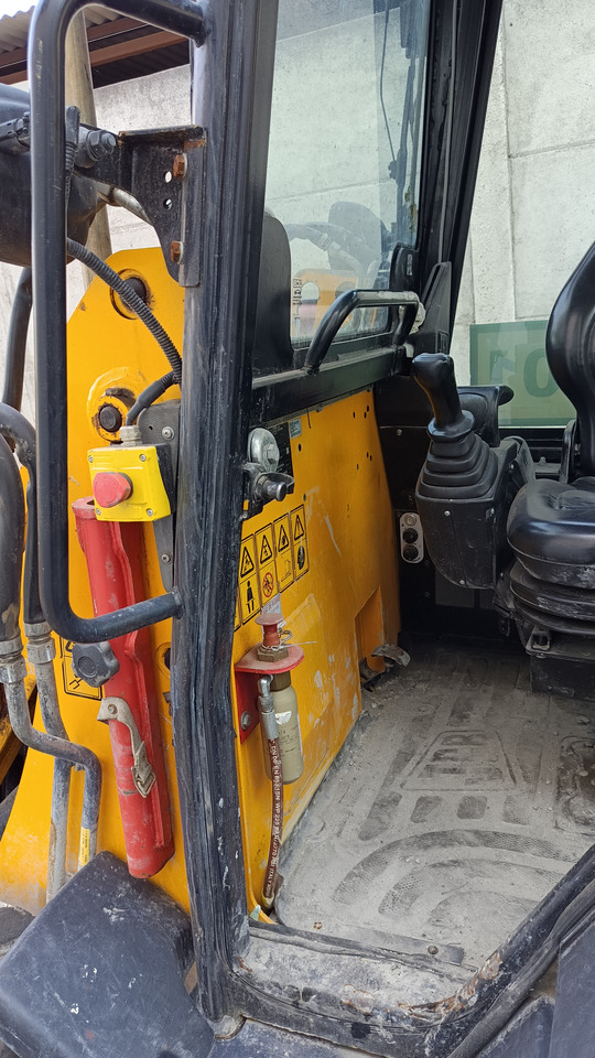 JCB 1CX 08M3WL - حفار متعدد الاستخدام: صور 5 JCB 1CX 08M3WL - حفار متعدد الاستخدام: صور 5