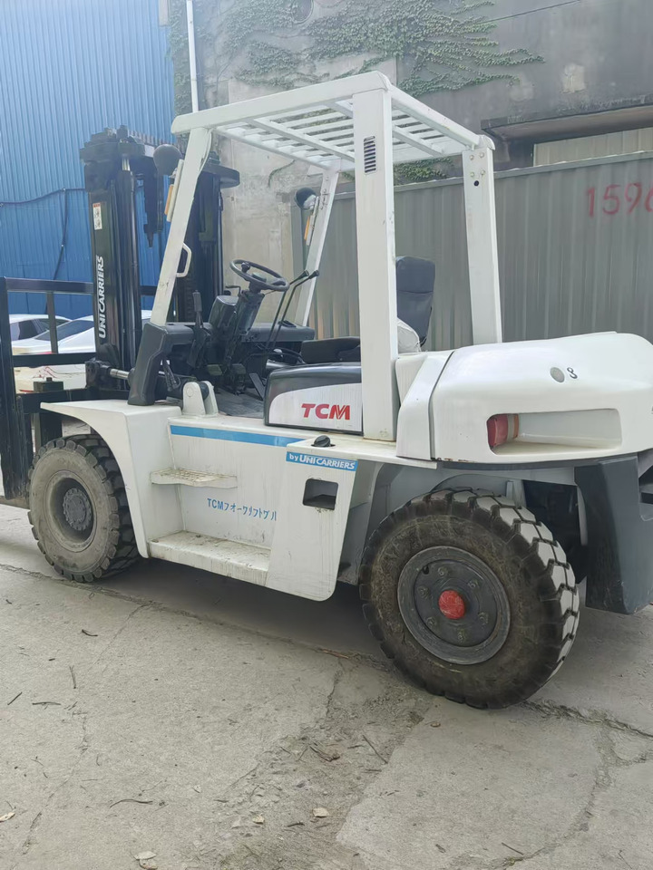 TCM FD50 Japan brand used 5 ton diesel forklift Customizable mast clamps - رافعة شوكية ديزل: صور 5 TCM FD50 Japan brand used 5 ton diesel forklift Customizable mast clamps - رافعة شوكية ديزل: صور 5
