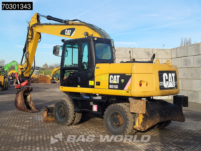 Caterpillar M315 D OUTRIGGERS + BLADE - حفارة على عجلات: صور 5 Caterpillar M315 D OUTRIGGERS + BLADE - حفارة على عجلات: صور 5