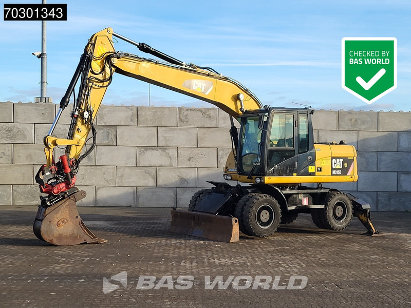 Caterpillar M315 D OUTRIGGERS + BLADE - حفارة على عجلات: صور 1 Caterpillar M315 D OUTRIGGERS + BLADE - حفارة على عجلات: صور 1