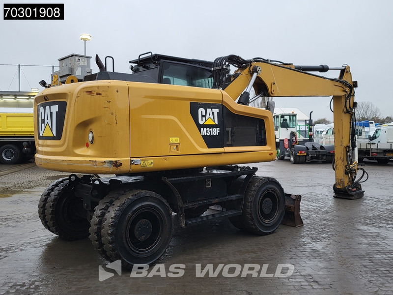 Caterpillar M318 F - حفارة على عجلات: صور 5 Caterpillar M318 F - حفارة على عجلات: صور 5