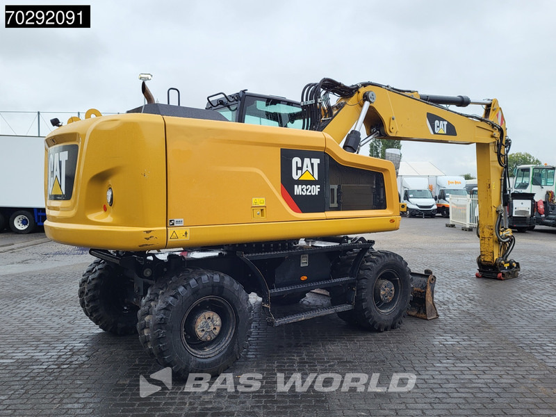 Caterpillar M320 F - حفارة على عجلات: صور 5 Caterpillar M320 F - حفارة على عجلات: صور 5