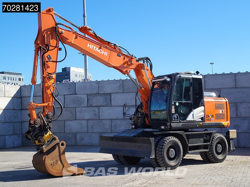 Hitachi ZX140W -5 OUTRIGGERS + BLADE - حفارة على عجلات: صور 2 Hitachi ZX140W -5 OUTRIGGERS + BLADE - حفارة على عجلات: صور 2
