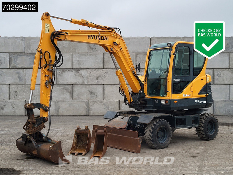 Hyundai Robex 55W-9A EPA - حفارة على عجلات: صور 1 Hyundai Robex 55W-9A EPA - حفارة على عجلات: صور 1