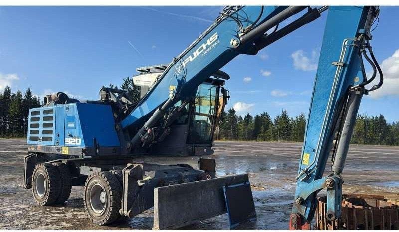 Fuchs MHL320F - حفارة النقل والشحن: صور 2 Fuchs MHL320F - حفارة النقل والشحن: صور 2