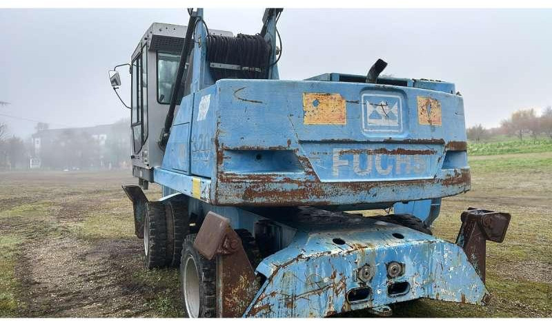 Fuchs MHL320 - حفارة النقل والشحن: صور 5 Fuchs MHL320 - حفارة النقل والشحن: صور 5