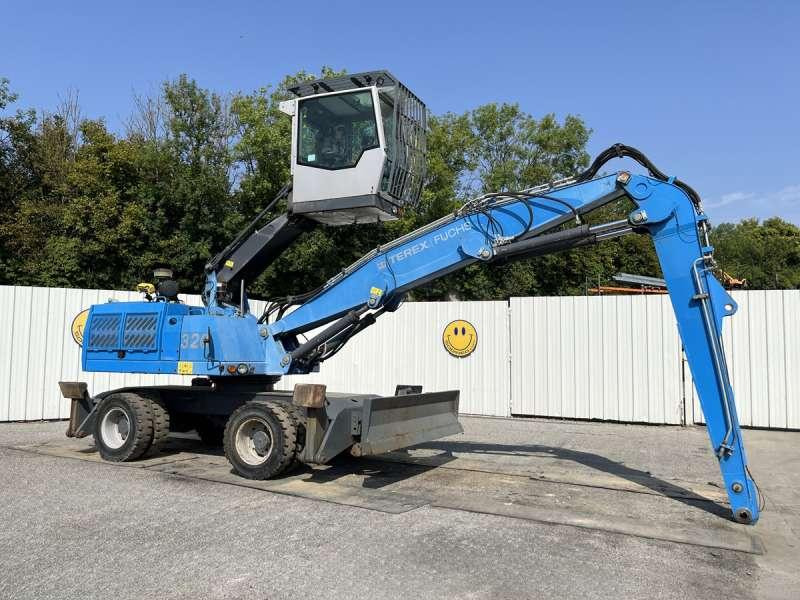 Fuchs MHL320 - حفارة النقل والشحن: صور 1 Fuchs MHL320 - حفارة النقل والشحن: صور 1