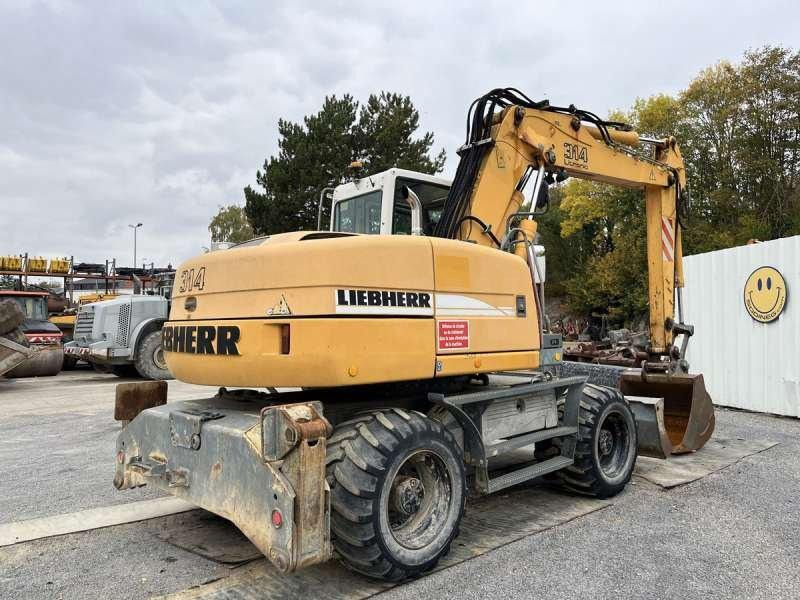 Liebherr A314 Litronic - حفارة على عجلات: صور 5 Liebherr A314 Litronic - حفارة على عجلات: صور 5