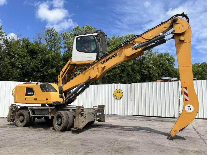 Liebherr LH26M LITRONIC - حفارة النقل والشحن: صور 1 Liebherr LH26M LITRONIC - حفارة النقل والشحن: صور 1