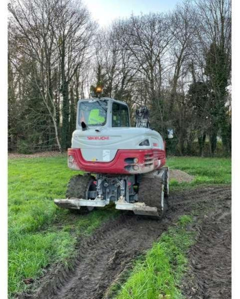 Takeuchi TB295W - حفارة على عجلات: صور 3 Takeuchi TB295W - حفارة على عجلات: صور 3