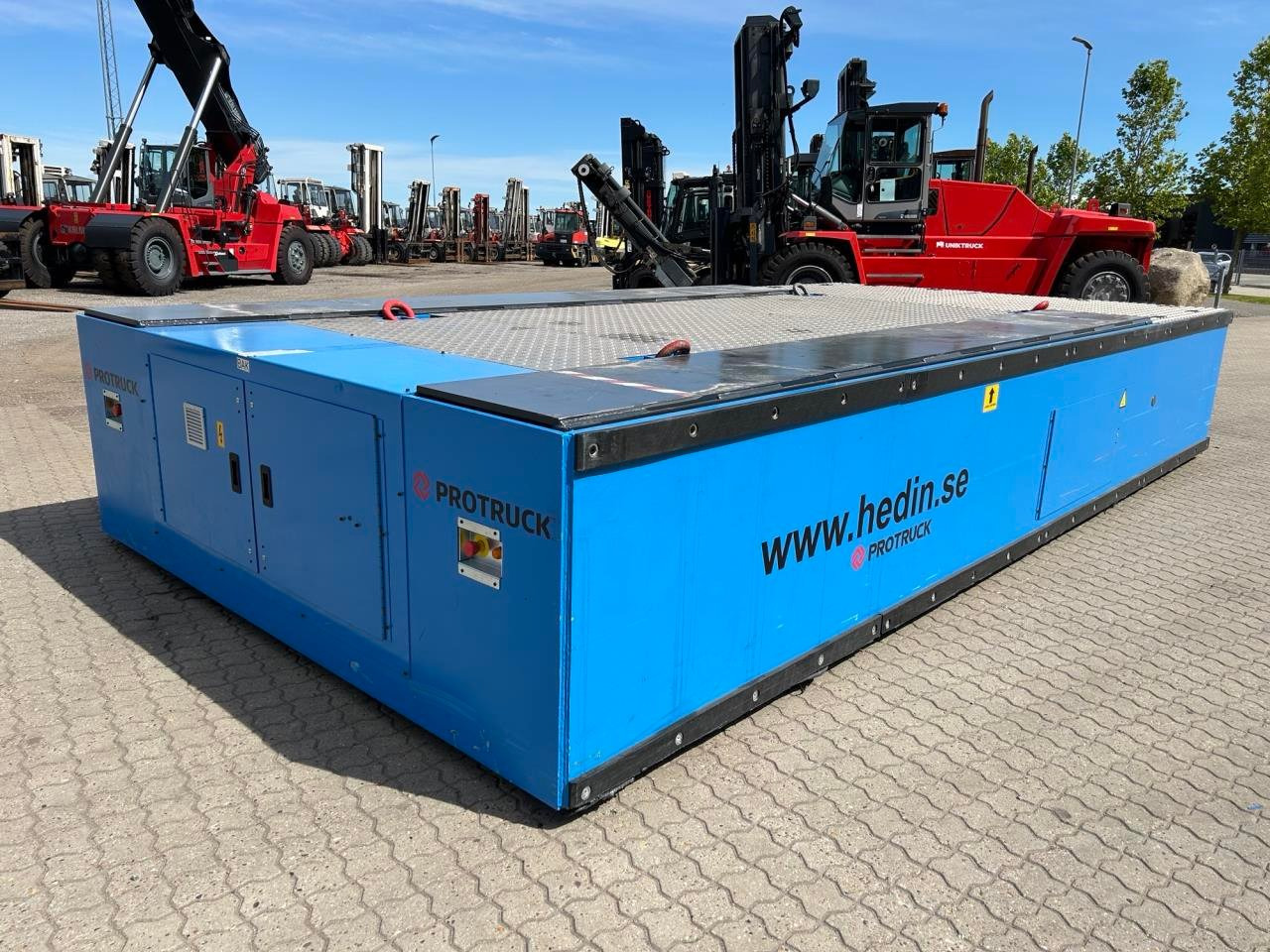 Hedin FLATBED MOVER - معدات المناولة: صور 1 Hedin FLATBED MOVER - معدات المناولة: صور 1