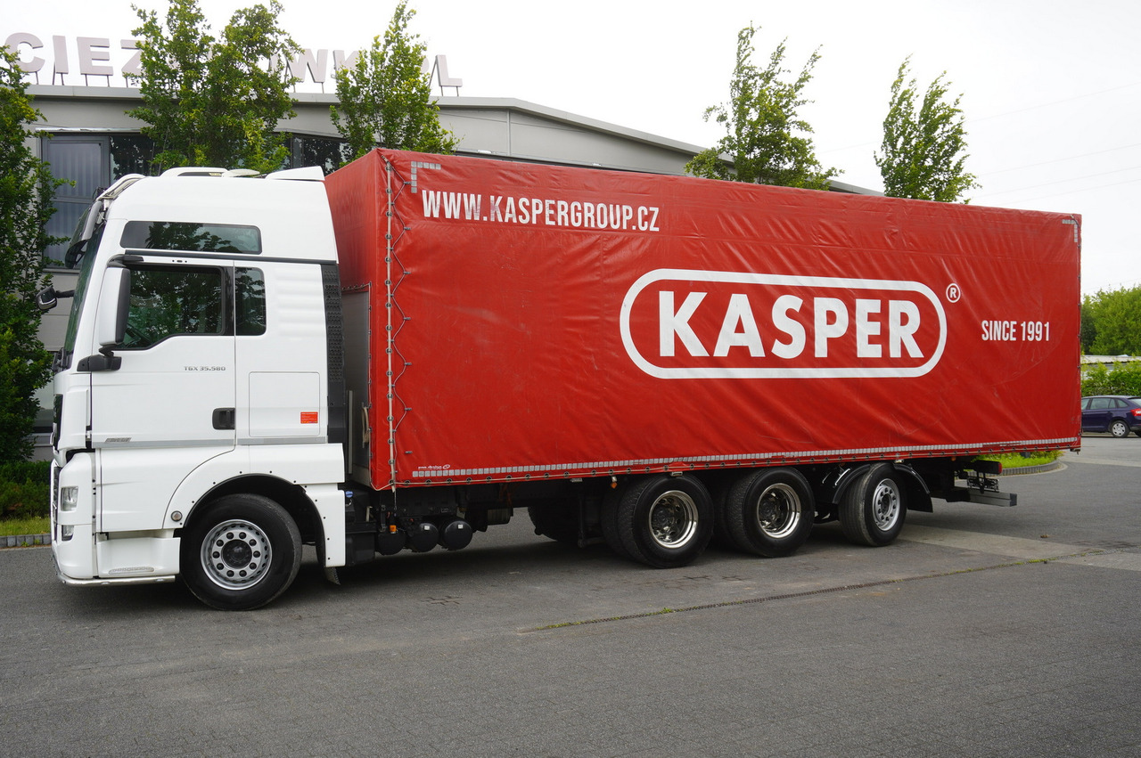 MAN TGX 35.580 E6 8x4 /4 / 23 EPAL tarp superstructure / 4th axle steered - شاحنة ستارة: صور 2 MAN TGX 35.580 E6 8x4 /4 / 23 EPAL tarp superstructure / 4th axle steered - شاحنة ستارة: صور 2