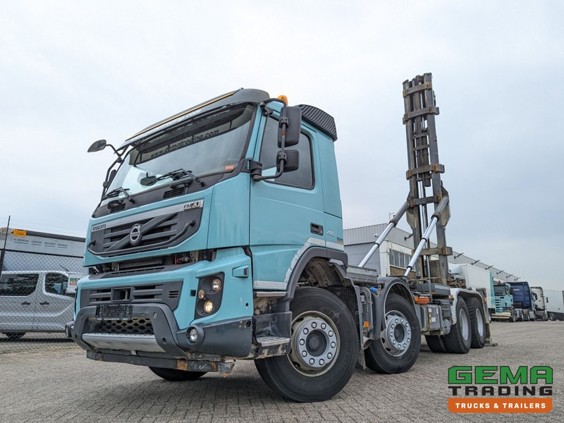Volvo FMX410 8x4 /4 Daycab Euro5 - Haakarm 25T - CementSilo - RadioGrafisch - Hydr. Steunpoten - NaafReductie - شاحنة ذات الخطاف: صور 1 Volvo FMX410 8x4 /4 Daycab Euro5 - Haakarm 25T - CementSilo - RadioGrafisch - Hydr. Steunpoten - NaafReductie - شاحنة ذات الخطاف: صور 1