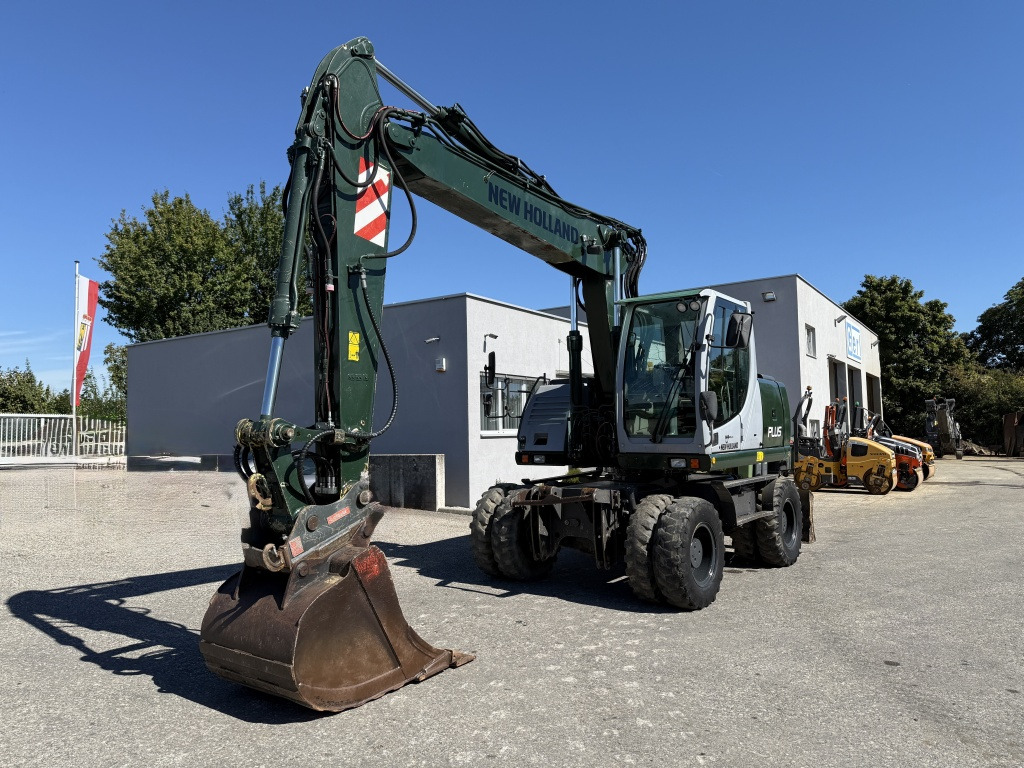 New Holland MH-Plus (111695) - حفارة على عجلات: صور 3 New Holland MH-Plus (111695) - حفارة على عجلات: صور 3