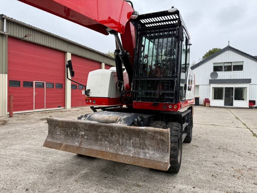 CAT M320F - حفارة على عجلات: صور 4 CAT M320F - حفارة على عجلات: صور 4