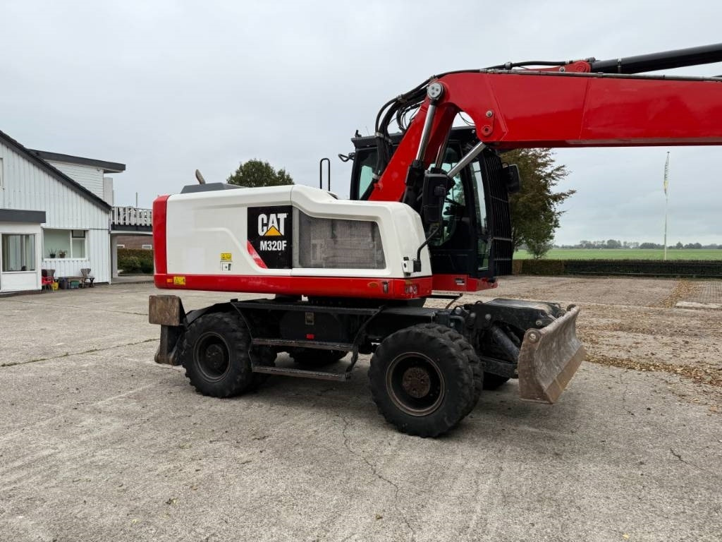 CAT M320F - حفارة على عجلات: صور 5 CAT M320F - حفارة على عجلات: صور 5