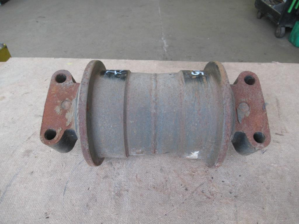 New Holland 73181638 - المسار الأسطوانة - آلات البناء: صور 1 New Holland 73181638 - المسار الأسطوانة - آلات البناء: صور 1