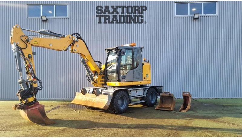 Liebherr A910 Compact, Hjulgrävare - حفارة على عجلات: صور 1 Liebherr A910 Compact, Hjulgrävare - حفارة على عجلات: صور 1