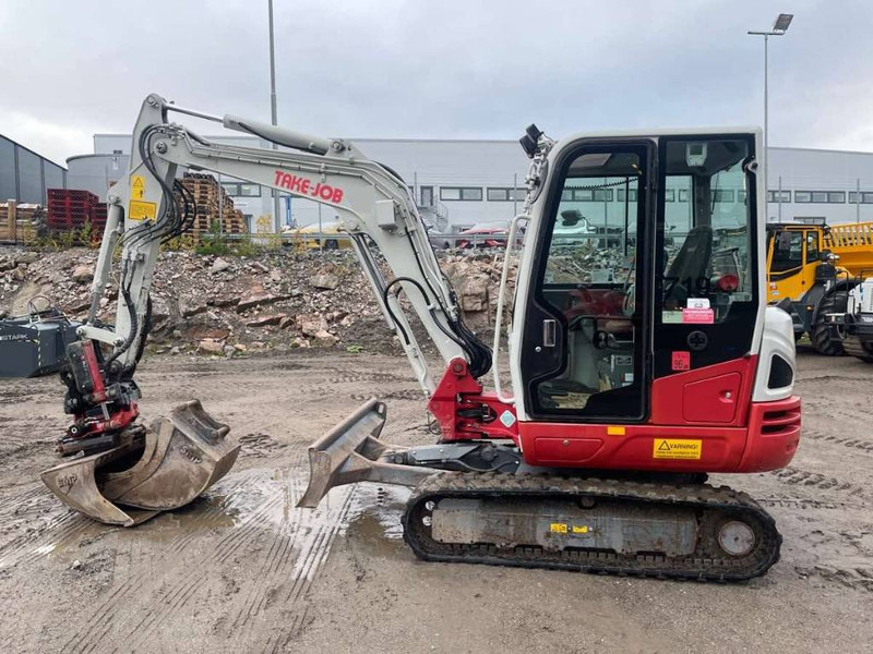 Takeuchi TB 240 - حفارة مصغرة: صور 1 Takeuchi TB 240 - حفارة مصغرة: صور 1
