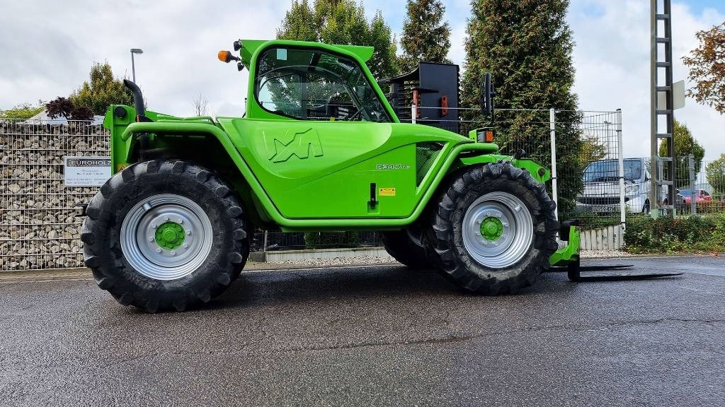 Merlo Radlader P34.7 Turbo 4x4, Allrad, Hubhöhe 7 m - اللودر بعجل: صور 4 Merlo Radlader P34.7 Turbo 4x4, Allrad, Hubhöhe 7 m - اللودر بعجل: صور 4
